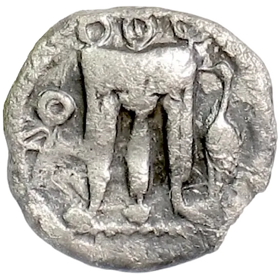 Tripod with legs ending in lions' paws and three rings on the bowl; heron standing to right in the field