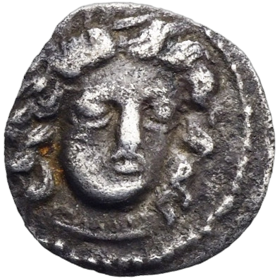 Head of nymph facing slightly right, wearing a hair band and a necklace; border of dots.