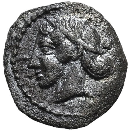 Head of nymph Aigeste left, wearing a pearl diadem and with her hair in a krobylos; border of dots.