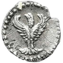 Eagle facing, head left, with wings spread.