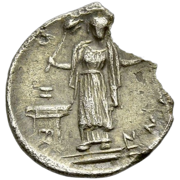 Demeter standing facing, holding torch and phiale; altar to left.