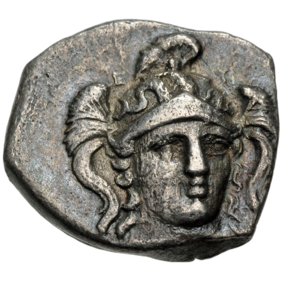 Head of Athena facing slightly right, wearing triple-crested helmet decorated with Skylla.