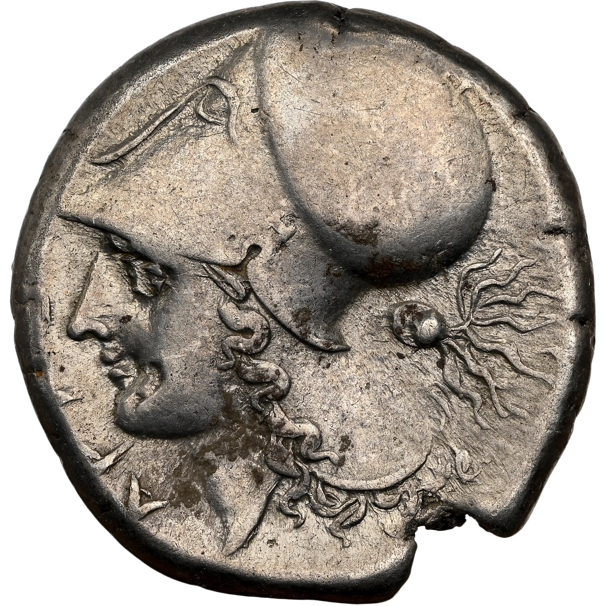 ΑΡΓΕΙ above or below; Head of Athena left, wearing Corinthian helmet; octopus behind.