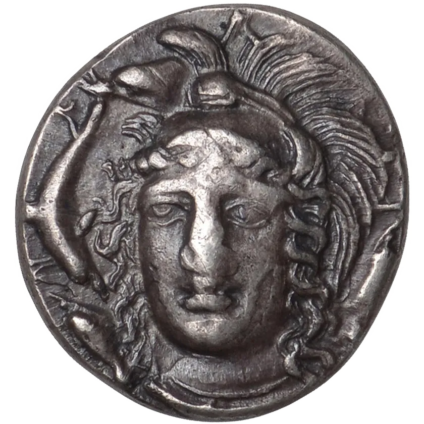 Head of Athena facing, turned slightly to the left, wearing triple-crested Attic helmet and plain necklace; around and behind her neck, four dolphins.