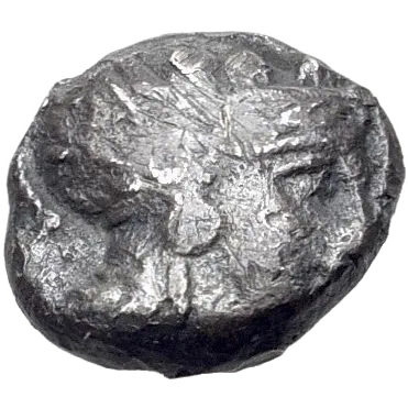 Head of Athena right, wearing crested Attic helmet decorated with three olive leaves and palmette.