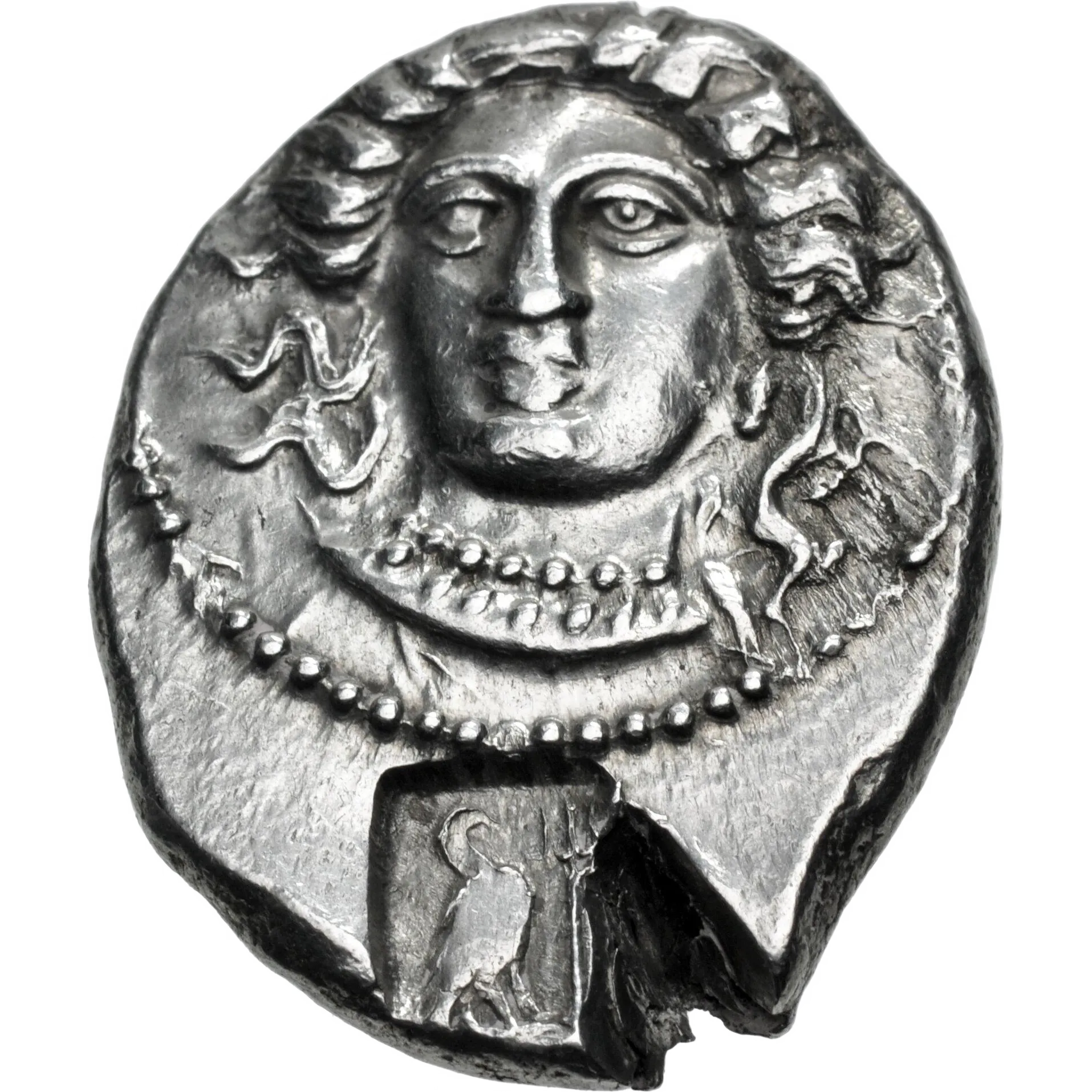 Female head (Arethusa?) facing slightly left, hair in ampyx, wearing necklace; c/m: eagle standing right before trident within incuse square