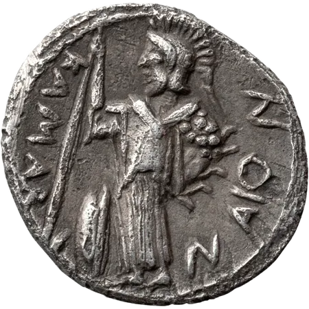 Athena standing left, holding spear; shield propped against leg. KAMAR I- NAION around