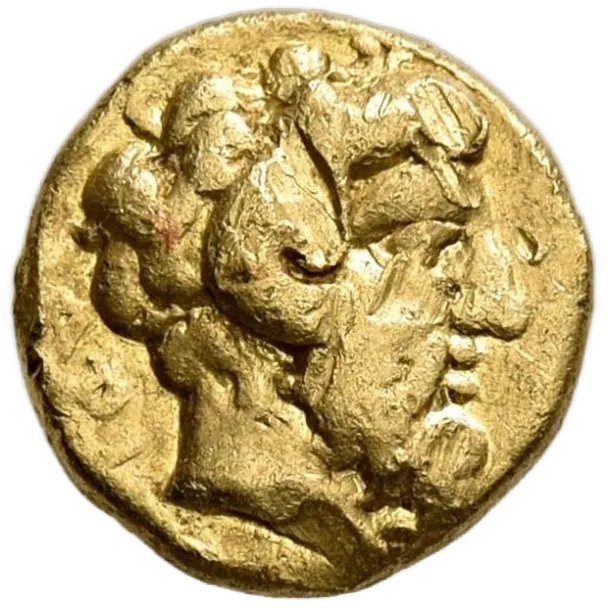 Bearded head of Zeus Ammon to right, with ram's horn over his ear; API left