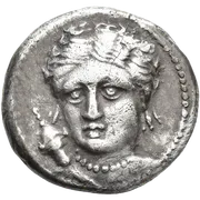 Facing head of Artemis turned slightly to left, wearing quiver, triple-pendant earring and beaded necklace