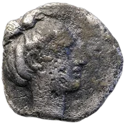 Head of Arethusa to right, with her hair tied up in a knot, wearing circular earring
