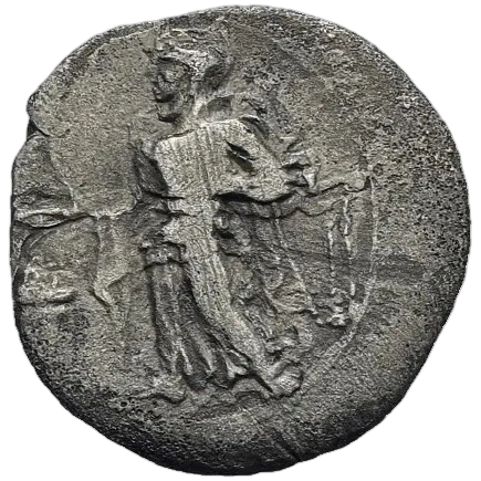 Female figure standing left, sacrificing from phiale over altar and holding filleted temple key