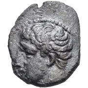 Young male head left; behind neck, swastika (not visible)