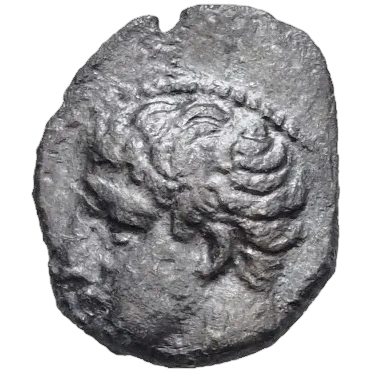 Young male head left; behind neck, swastika (not visible)