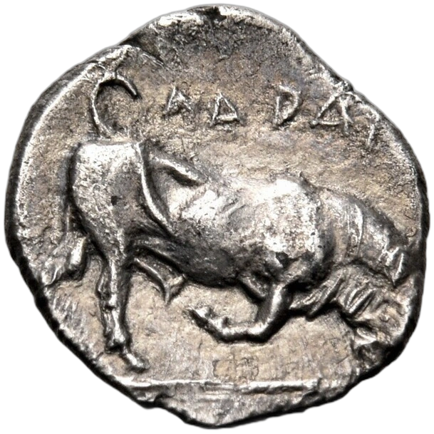 Bull butting right; in exergue, fish swimming right